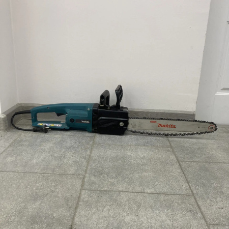 Электрическая пила MAKITA  uc4003a