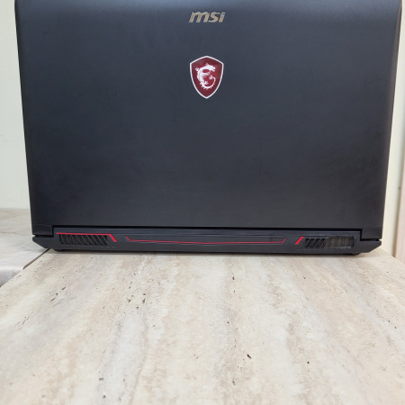 Ноутбук MSI GL62M 7REX-2673XRU 15,6"/ Core i7 7700HQ/ 8 гб/ SSD 128 гб/ HDD 500 гб/ NVIDIA GeForce GTX 1050 Ti 4 гб